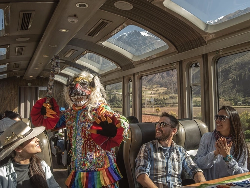 Diablada dancer on the train to Machu Picchu.