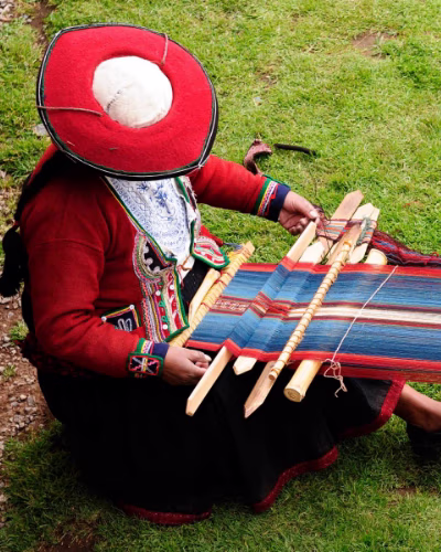 On the trail from Lares to Machu Picchu, girl with her llamas.