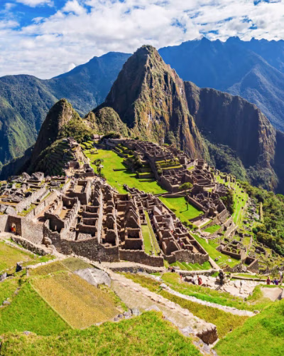 On the trail from Lares to Machu Picchu, girl with her llamas.