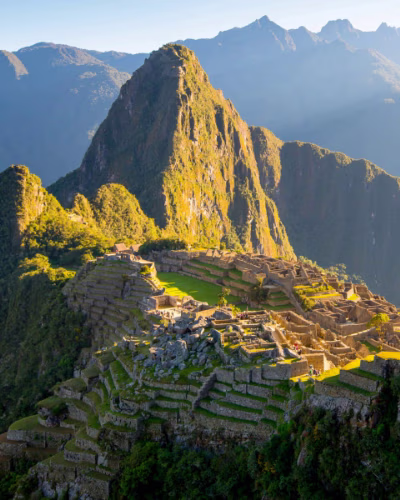 On the trail from Lares to Machu Picchu, girl with her llamas.