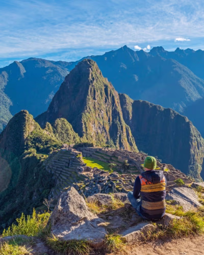 On the trail from Lares to Machu Picchu, girl with her llamas.