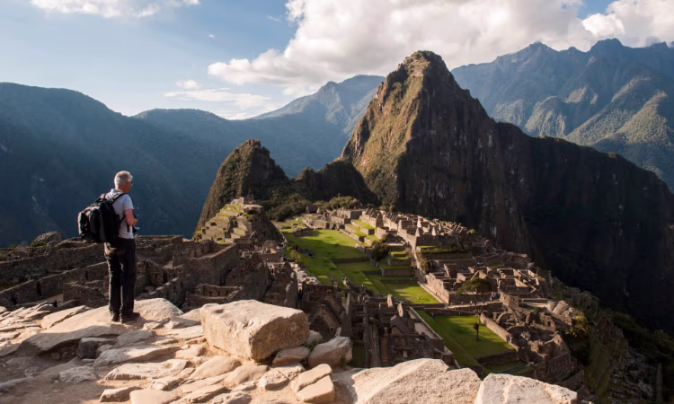 On the trail from Lares to Machu Picchu, girl with her llamas.