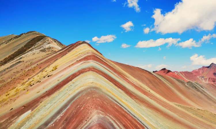 On the trail from Lares to Machu Picchu, girl with her llamas.
